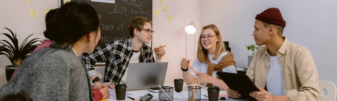 Students Meeting around a table